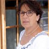 portrait-middle-aged-brunette-woman-eyeglasses-outdoor-96856021